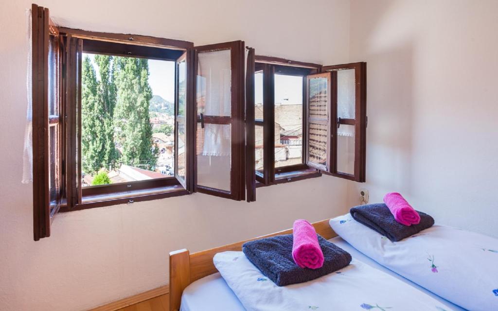 Postel nebo postele na pokoji v ubytování Guesthouse Nina