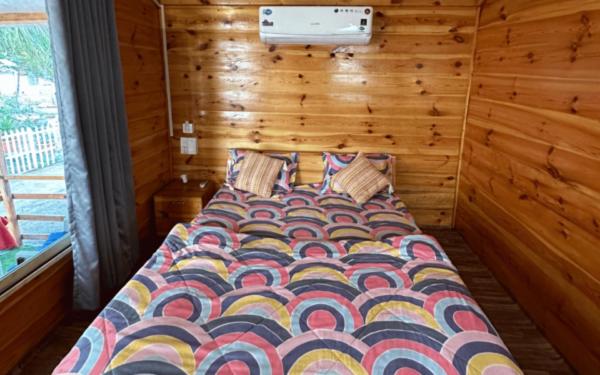 Postel nebo postele na pokoji v ubytování Basho beach Resort