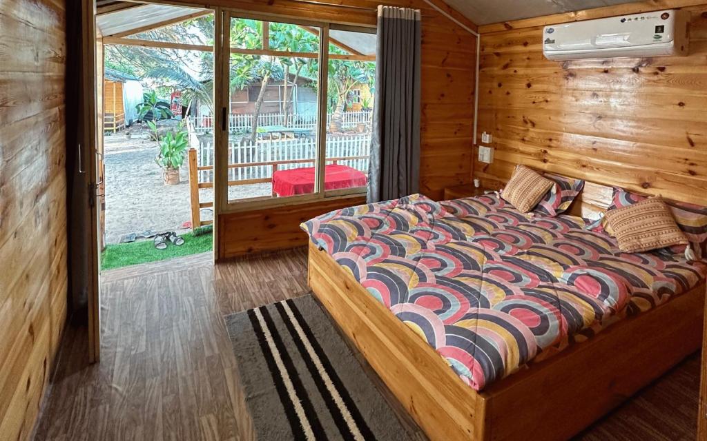 Postel nebo postele na pokoji v ubytování Basho beach Resort