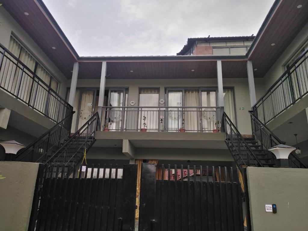 an image of a building with stairs in front at NHC full cottage in Nandi