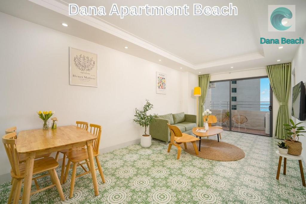 a living room with a table and a dining room at Muong Thanh Son Tra Apartment Seaview Da Nang in Da Nang