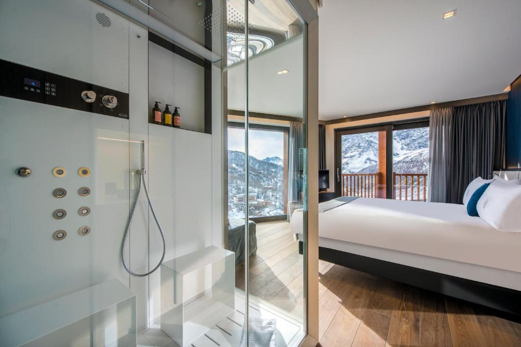 Postel nebo postele na pokoji v ubytování Hotel Principe delle Nevi