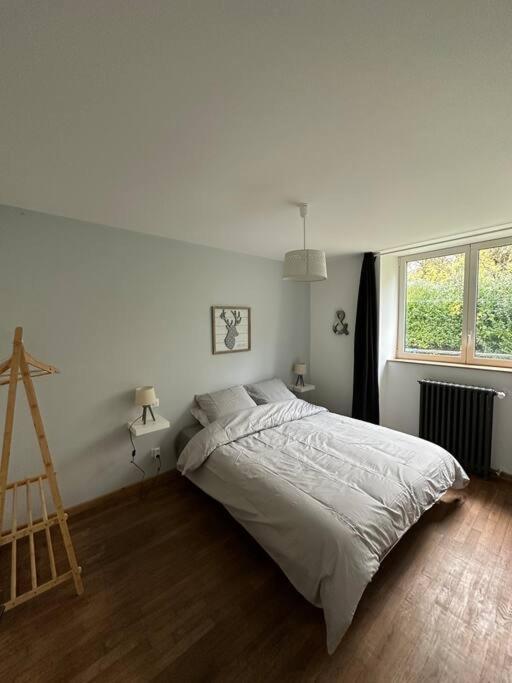 Postel nebo postele na pokoji v ubytování Gîte 10 personnes avec spa privatif