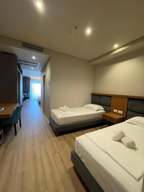 Postel nebo postele na pokoji v ubytování AMR Hotel - Durres