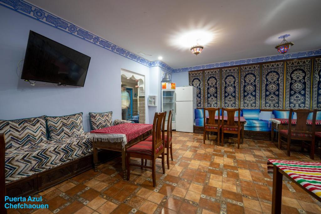 TV a/nebo společenská místnost v ubytování Puerta Azul