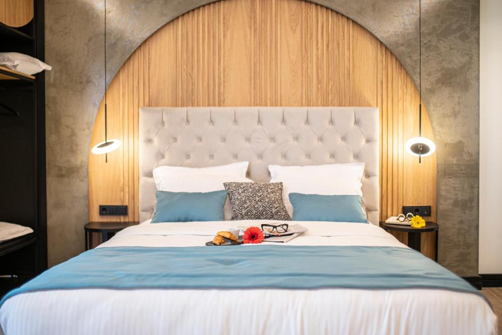 Łóżko lub łóżka w pokoju w obiekcie Thalassa Apart Hotel