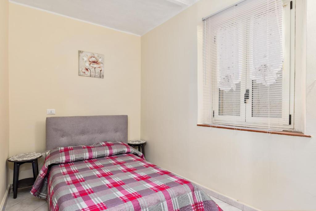 Postel nebo postele na pokoji v ubytování [10 min Torino] Moderna Casa Due Piani con Cortile