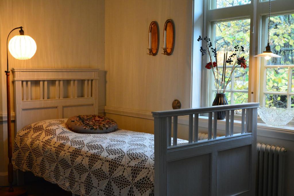 Postel nebo postele na pokoji v ubytování Lilla Hotellet