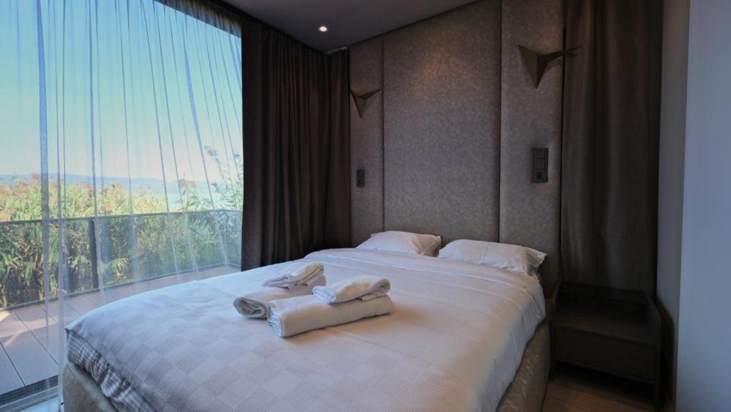 Postel nebo postele na pokoji v ubytování Velour Hotel Spa Restaurant