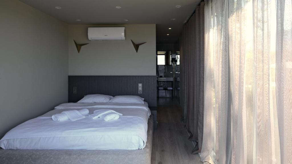 Postel nebo postele na pokoji v ubytování Velour Hotel Spa Restaurant