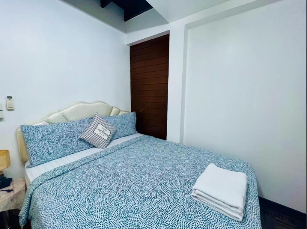Postel nebo postele na pokoji v ubytování Ree Guesthouse