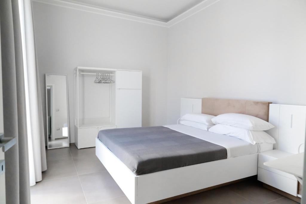 Posteľ alebo postele v izbe v ubytovaní Bottego24 Suite, Apartment & Terrace