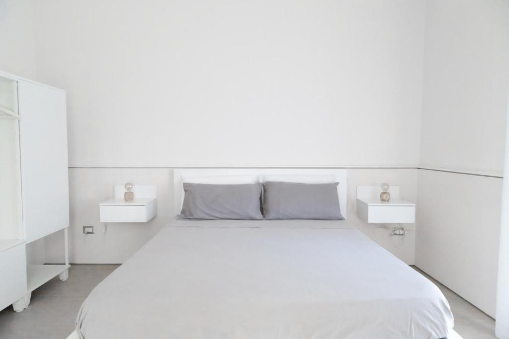 Posteľ alebo postele v izbe v ubytovaní Bottego24 Suite, Apartment & Terrace