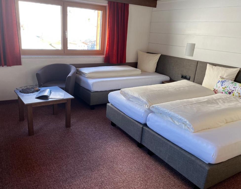 Posteľ alebo postele v izbe v ubytovaní Nonas B&B