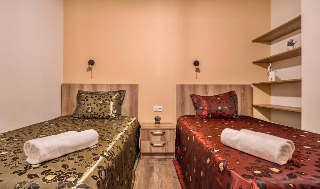Postel nebo postele na pokoji v ubytování GVC 3-room 412 New Gudauri