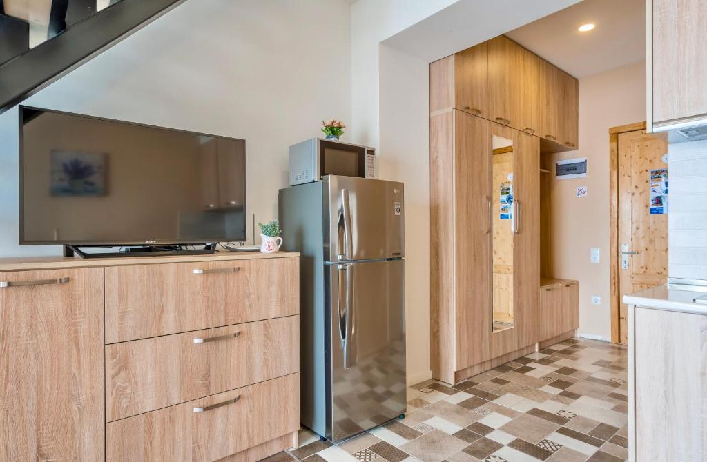 Kuchyň nebo kuchyňský kout v ubytování GVC 3-room 412 New Gudauri