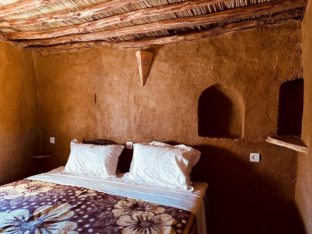 Posteľ alebo postele v izbe v ubytovaní Camp M'hamid Ras N'khal