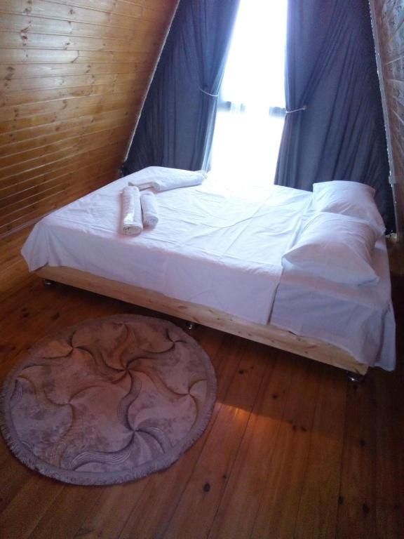 Postel nebo postele na pokoji v ubytování Cottage "Sunset"