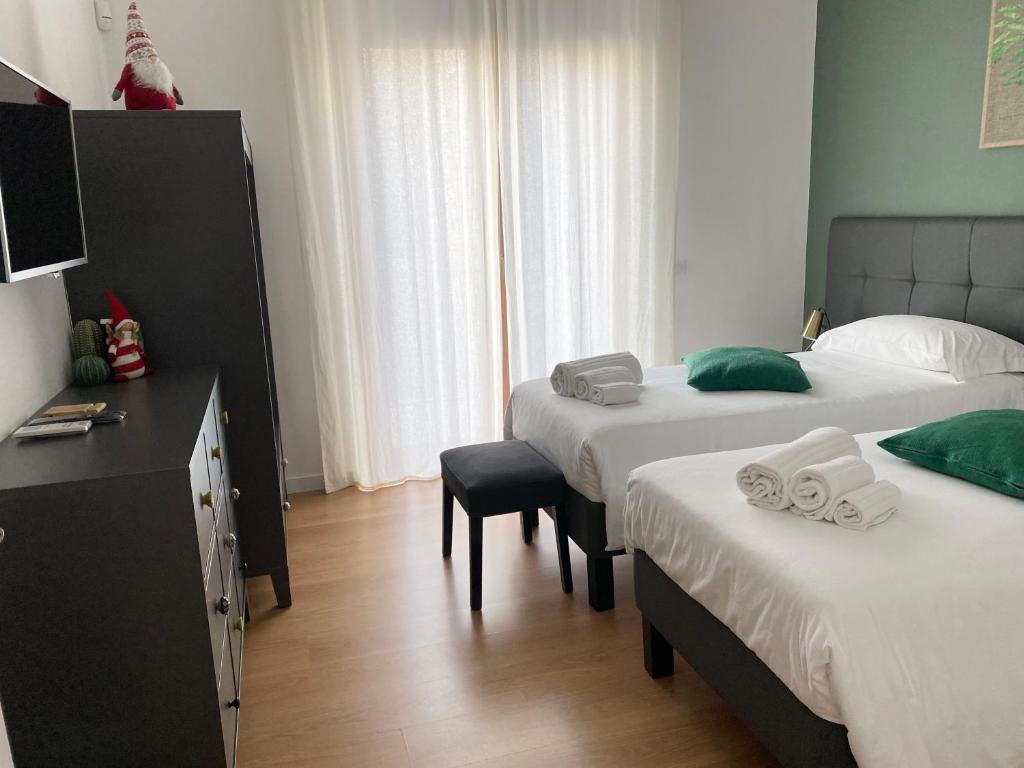 Łóżko lub łóżka w pokoju w obiekcie Home 22 Appartamento in centro storico - Catania