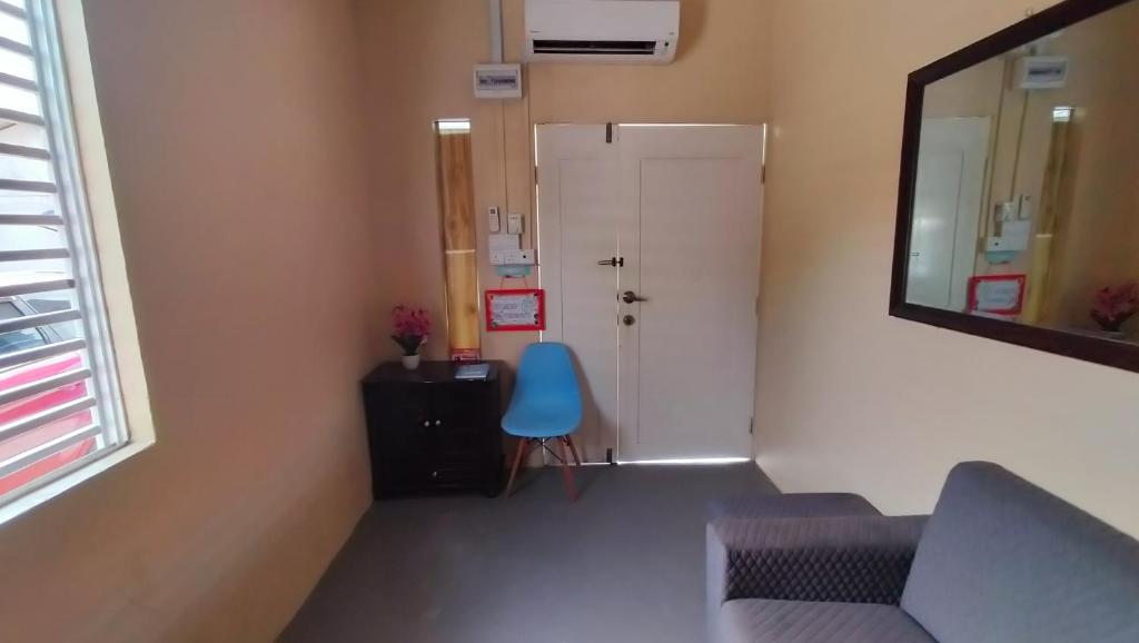 Posezení v ubytování Ishak Kaseh Homestay