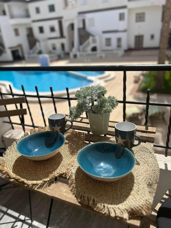 Bazén v ubytování Punta Prima Palm Beach Apartment nebo v jeho okolí