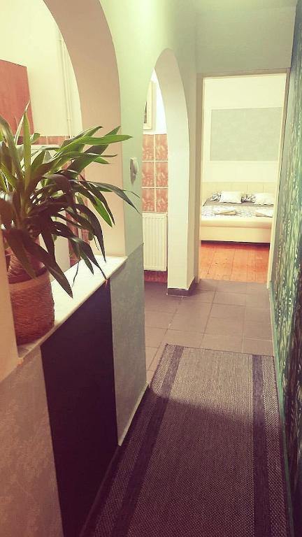 Postel nebo postele na pokoji v ubytování Apartman Centar