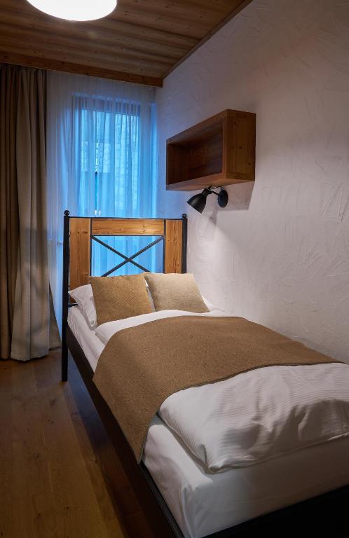 Postel nebo postele na pokoji v ubytování Chalety Otupné - Apartmán Lorien