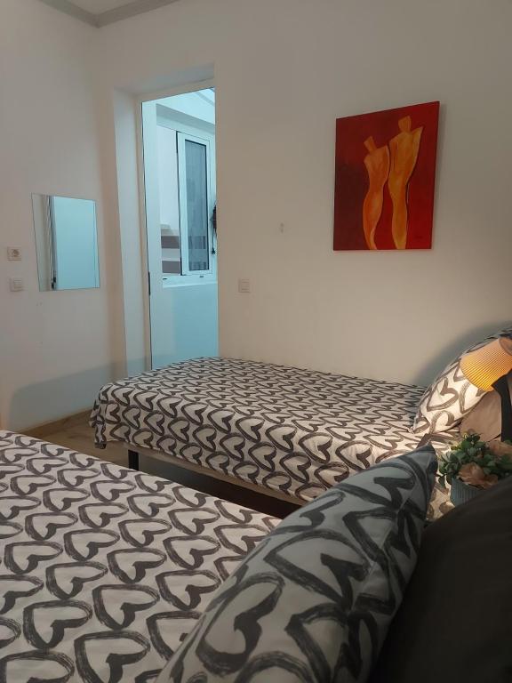 Ένα ή περισσότερα κρεβάτια σε δωμάτιο στο Nice flat in Arrecife - perfect location