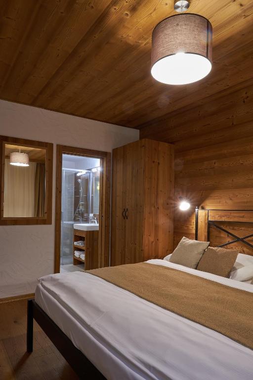 Postel nebo postele na pokoji v ubytování Chalety Otupné - Apartmán Lorien