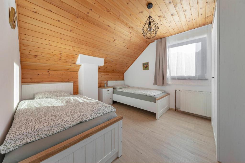 Postel nebo postele na pokoji v ubytování Holiday Home Kersnik