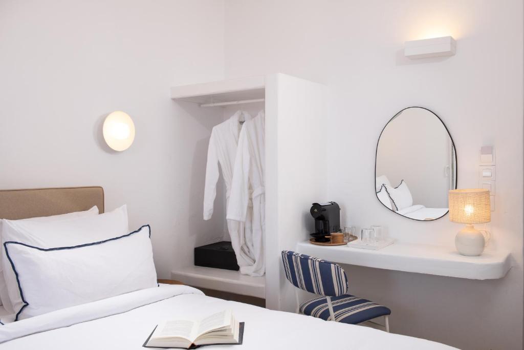 Posteľ alebo postele v izbe v ubytovaní Hotel Tagoo