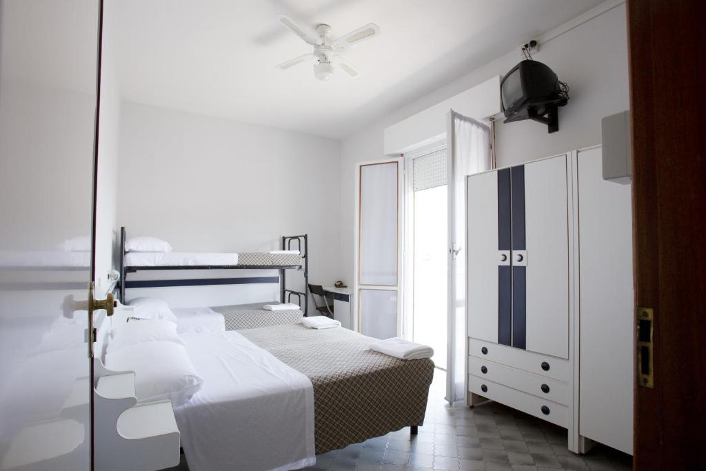 Postel nebo postele na pokoji v ubytování Hotel B&B Avana