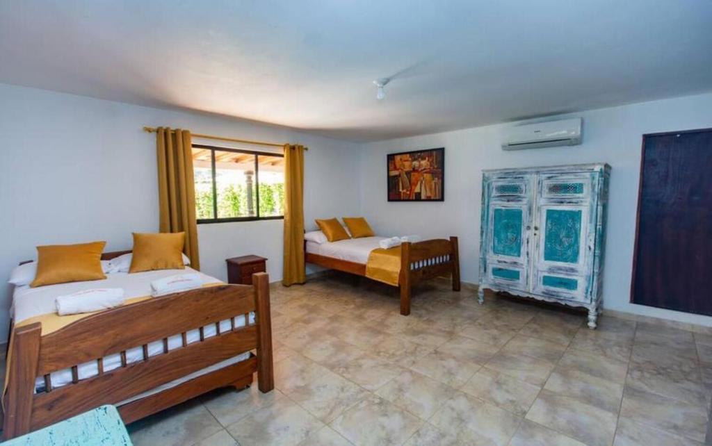 Postel nebo postele na pokoji v ubytování Hotel San Sebastian del Tonusco