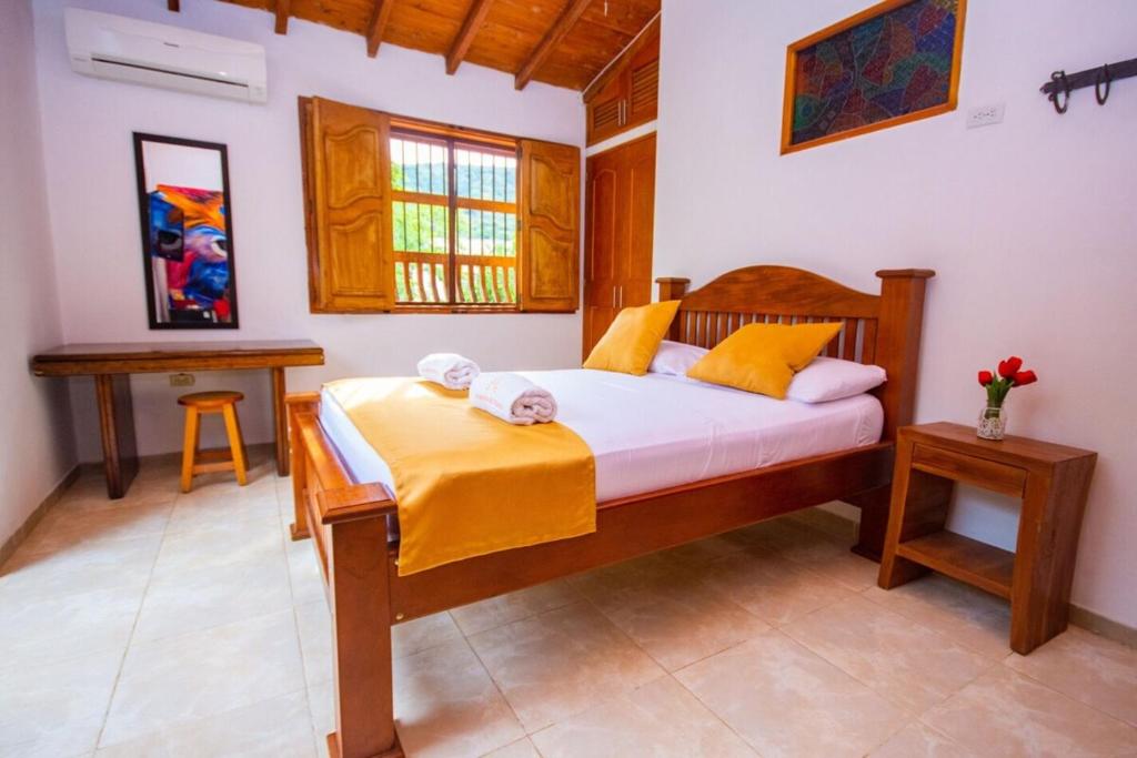 Postel nebo postele na pokoji v ubytování Hotel San Sebastian del Tonusco