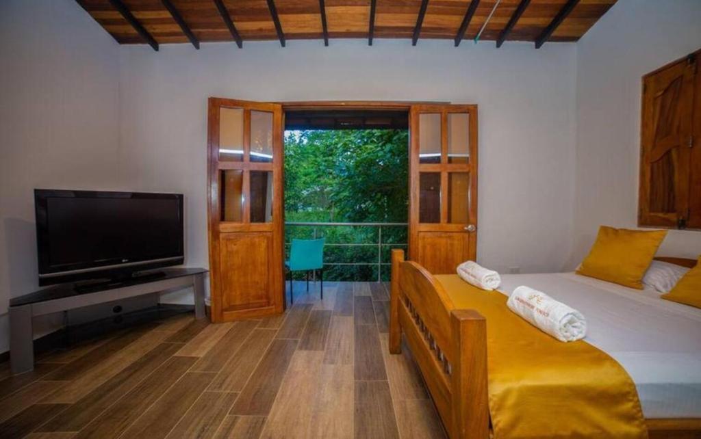 TV a/nebo společenská místnost v ubytování Hotel San Sebastian del Tonusco