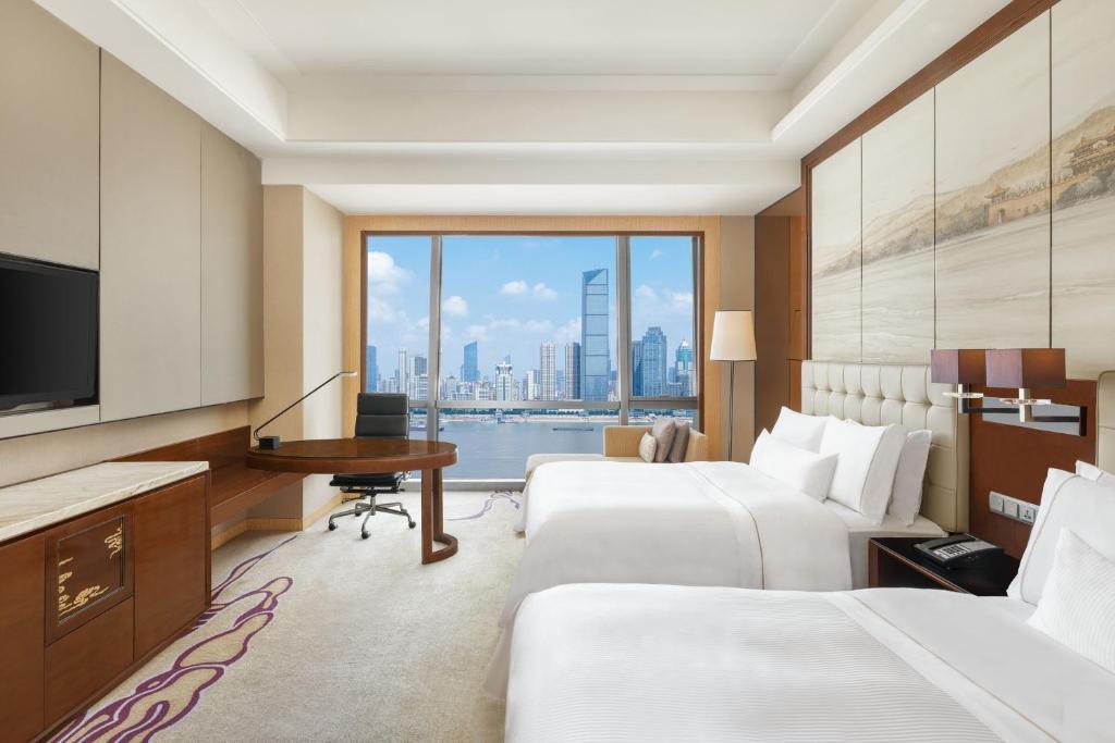 TV a/nebo společenská místnost v ubytování The Westin Wuhan Wuchang