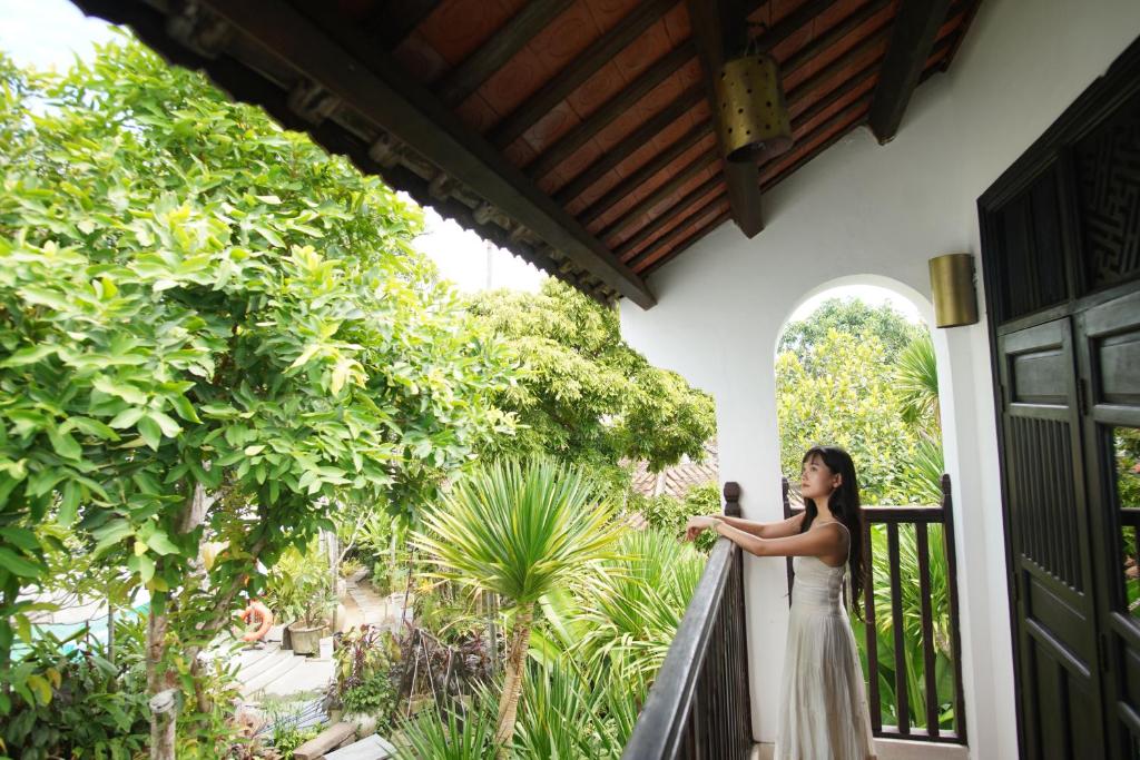 Balkón nebo terasa v ubytování Hoi An Ancient House Resort & Spa
