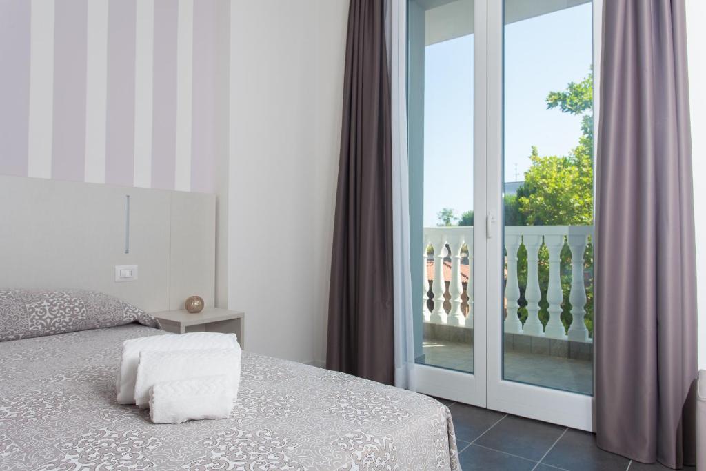 Postel nebo postele na pokoji v ubytování Hotel Star