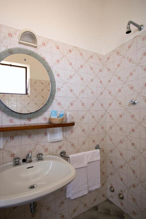 Koupelna v ubytování Hotel B&B Avana