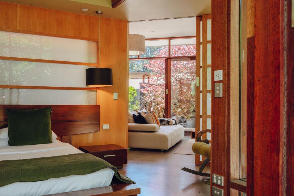 Postel nebo postele na pokoji v ubytování Sticky Rice Villas