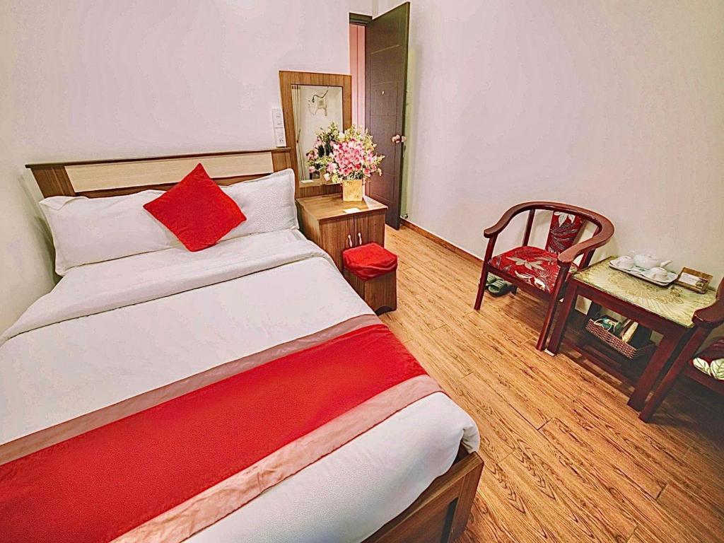 Postel nebo postele na pokoji v ubytování Le Tuan Minh Hotel