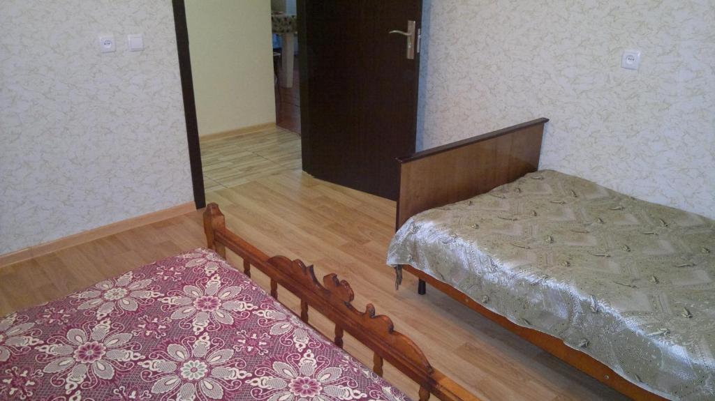 Llit o llits en una habitació de Guest House Besarioni