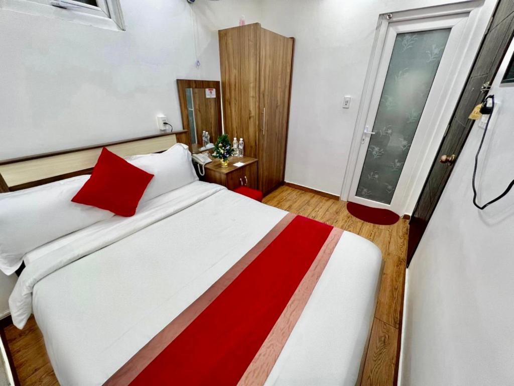 Postel nebo postele na pokoji v ubytování Le Tuan Minh Hotel