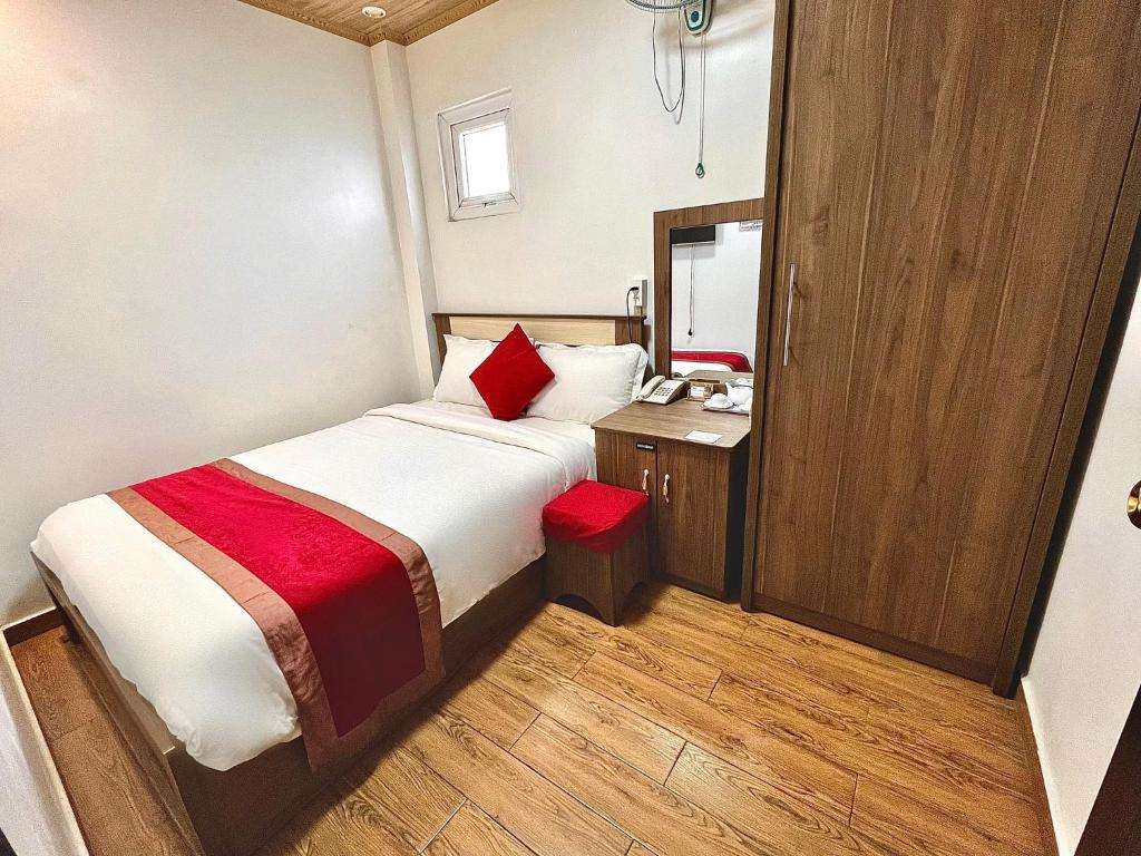 Postel nebo postele na pokoji v ubytování Le Tuan Minh Hotel