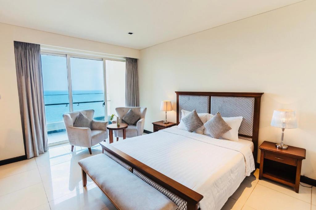 Giường trong phòng chung tại Luxury Seaview Apartments managed by Anh