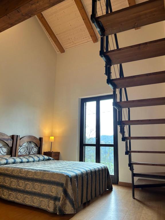 Postel nebo postele na pokoji v ubytování Nutrilamente country house