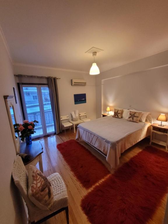 Posteľ alebo postele v izbe v ubytovaní Lefkada Center Apartments