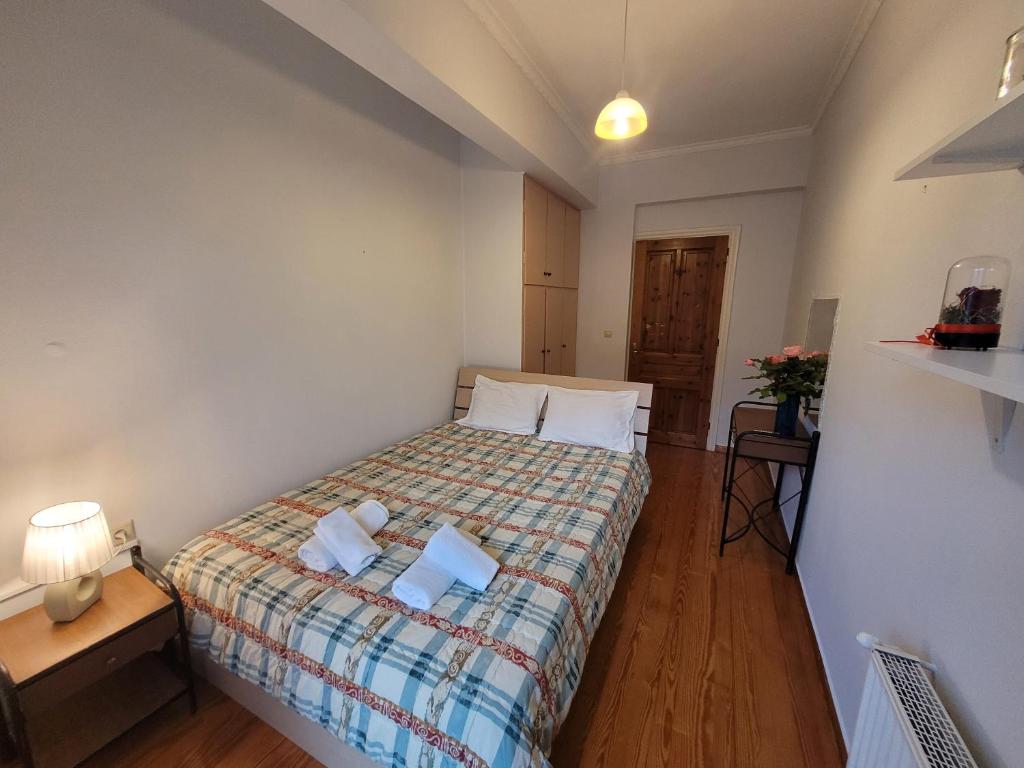 Posteľ alebo postele v izbe v ubytovaní Lefkada Center Apartments