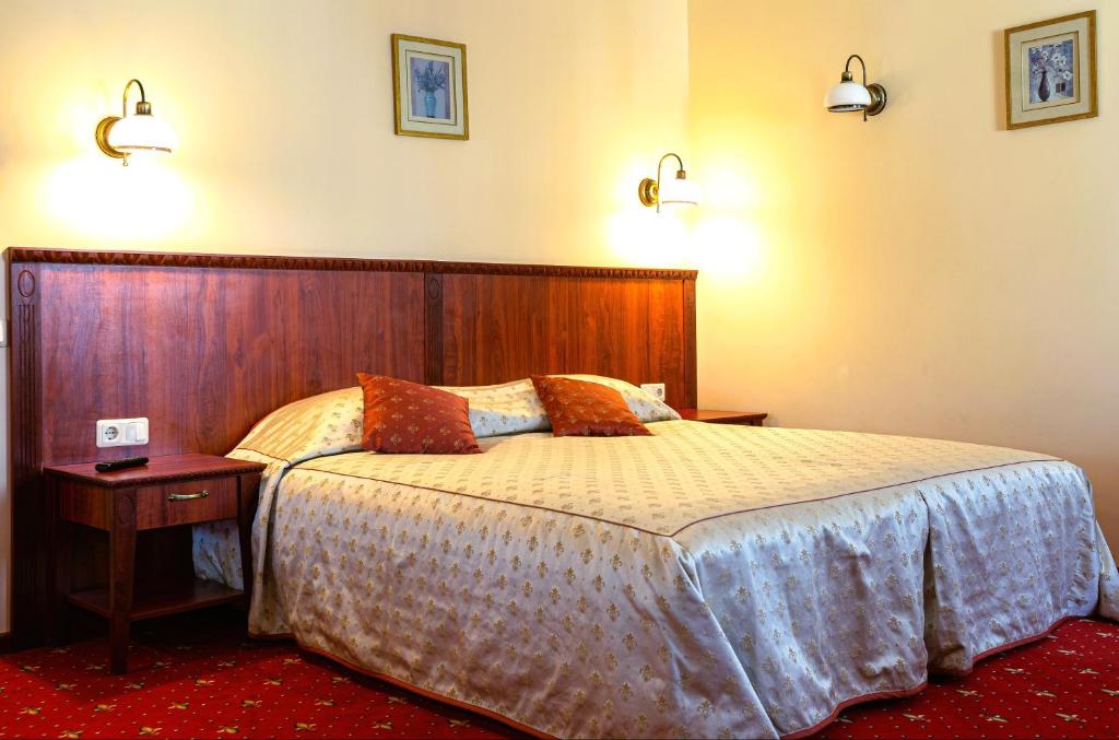Cama o camas de una habitación en Galia Apartments in Druskininkai