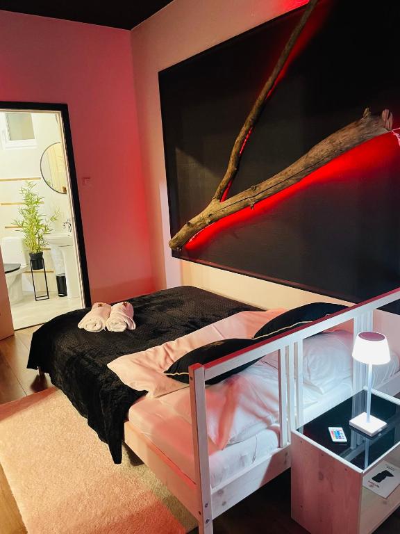 Postel nebo postele na pokoji v ubytování Apartamenty Paszkówka